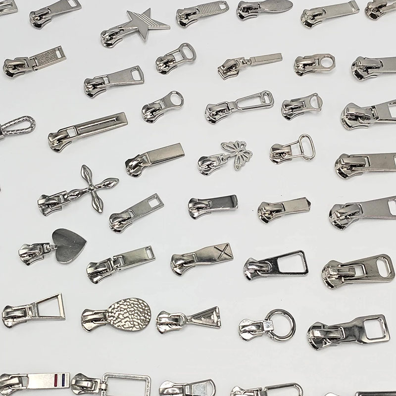 Zipper sliders and pullers